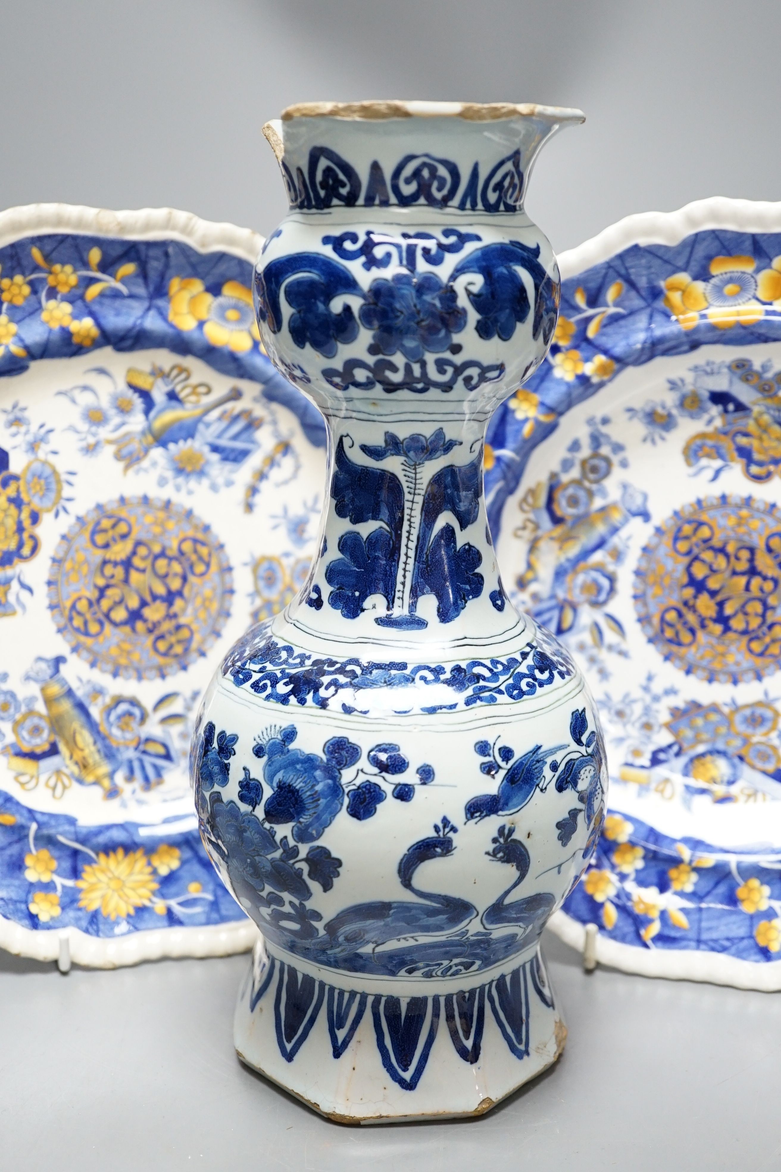 An 18th century Deflt vase and two early 19th century Spode pottery dishes, vase 24 cms high